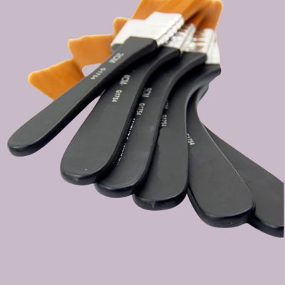 Lot pinceaux superposés décalés manche noir