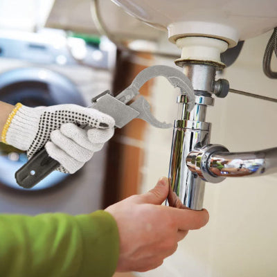Main gantee tenant pince sur syphon lavabo