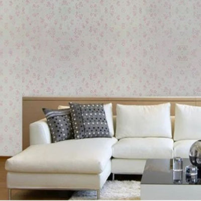 Mur motifs salon canapé d'angle assise coussin blanc bout table basse