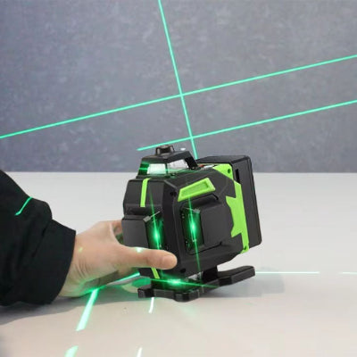 Niveau laser pose au sol lignes vertes diagonales